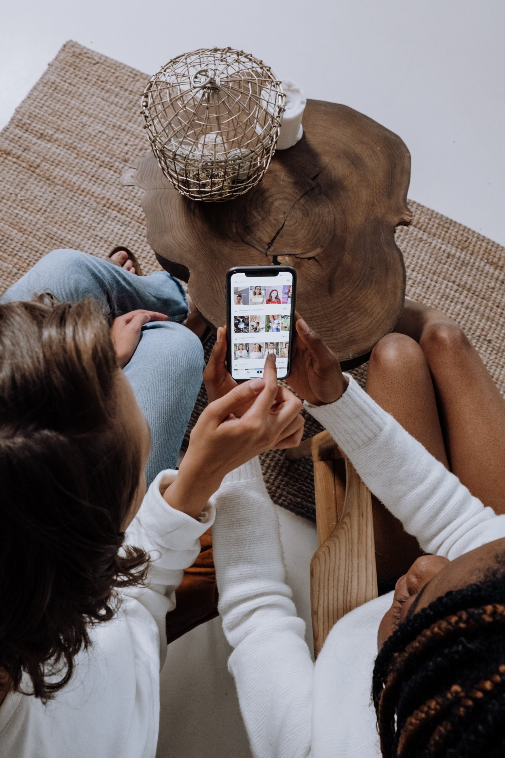two women on a smart mobile phone on social media